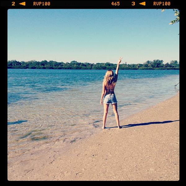 Ashley Tisdale in a bikini - ass