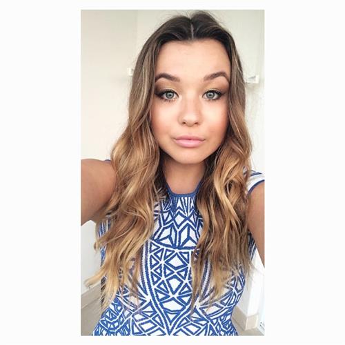 Torri Webster taking a selfie