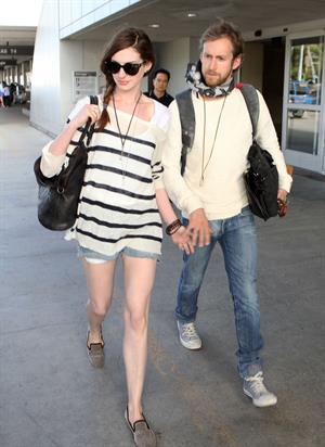Anne Hathaway arrives at LAX airport in Los Angeles on September 3, 2011