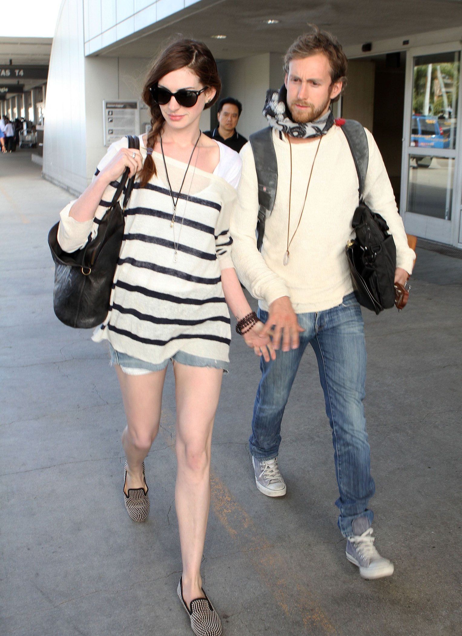 Anne Hathaway arrives at LAX airport in Los Angeles on September 3, 2011