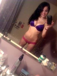 Anonymous in lingerie taking a selfie