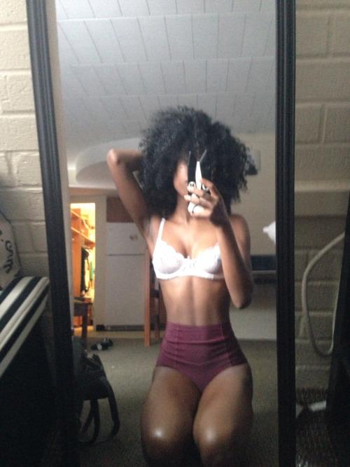 Anonymous in lingerie taking a selfie