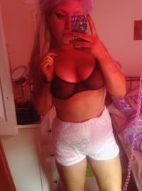 Anonymous in lingerie taking a selfie