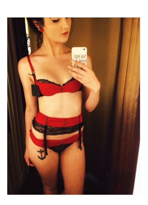 Anonymous in lingerie taking a selfie