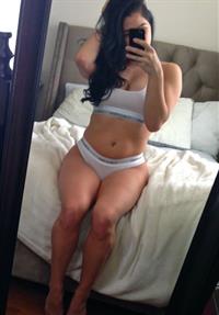 Anonymous in lingerie taking a selfie