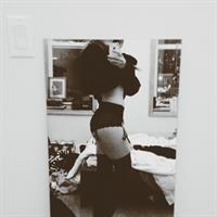 Anonymous in lingerie taking a selfie