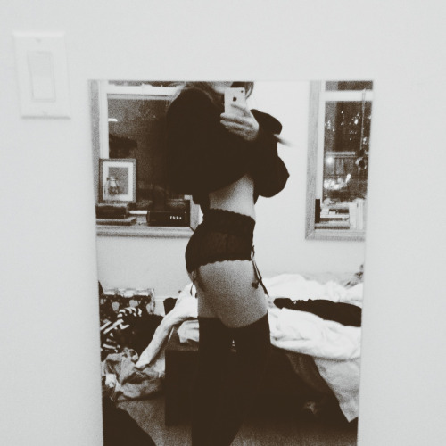 Anonymous in lingerie taking a selfie