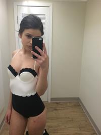 Anonymous in lingerie taking a selfie