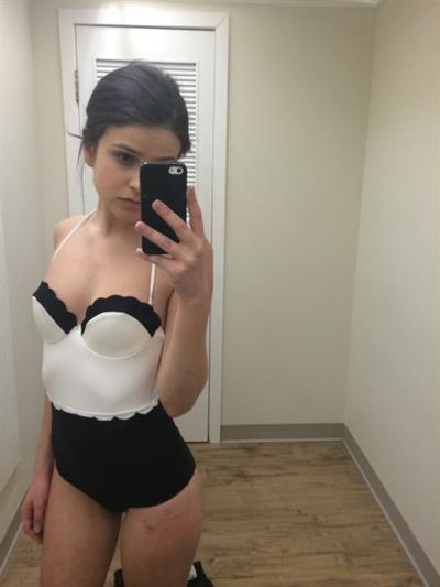 Anonymous in lingerie taking a selfie