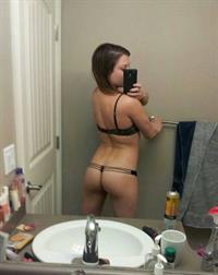 Anonymous in lingerie taking a selfie and - ass