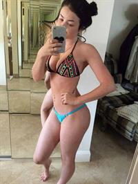 Mallory King in a bikini taking a selfie