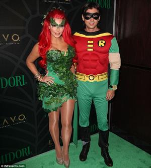Kim Kardashian as Poison Ivy for the 2011 Midori Green Halloween party in New York