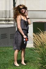 Ashley Greene walking her dog around her hotel in Detroit on July 17, 2010 