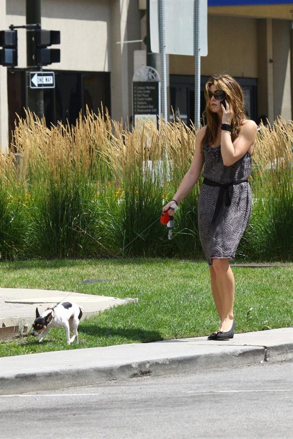 Ashley Greene walking her dog around her hotel in Detroit on July 17, 2010 
