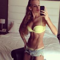 Olya Abramovich in lingerie taking a selfie