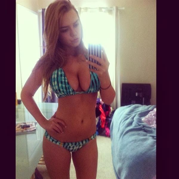 Lauren Hanley in a bikini taking a selfie