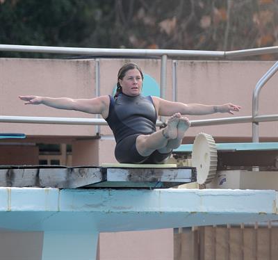 Nicole Eggert prepares for 'Splash' (sports bra/wetsuit) 6.2.2013 