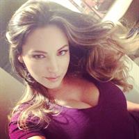 Kelly Brook taking a selfie