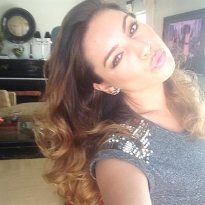 Kelly Brook taking a selfie