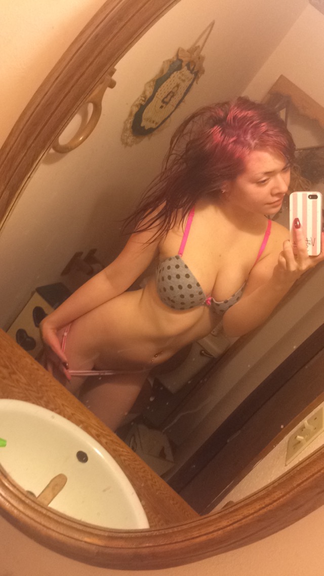 Anonymous in lingerie taking a selfie