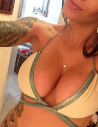 Anonymous in a bikini taking a selfie