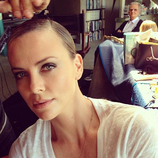 Charlize Theron taking a selfie