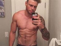 Gus Kenworthy taking a selfie