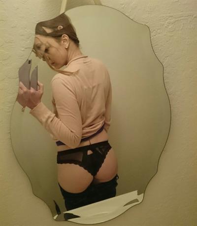 Anonymous in lingerie taking a selfie and - ass