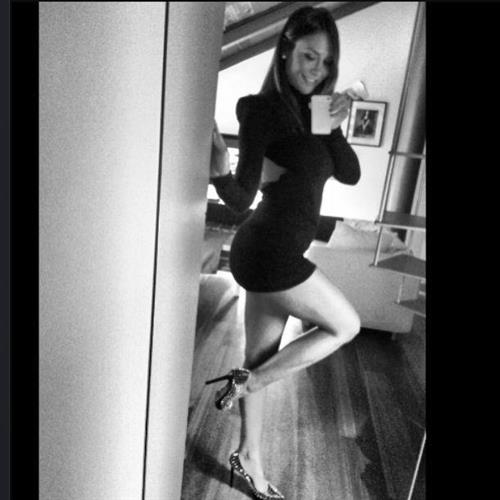 Nicole Minetti taking a selfie