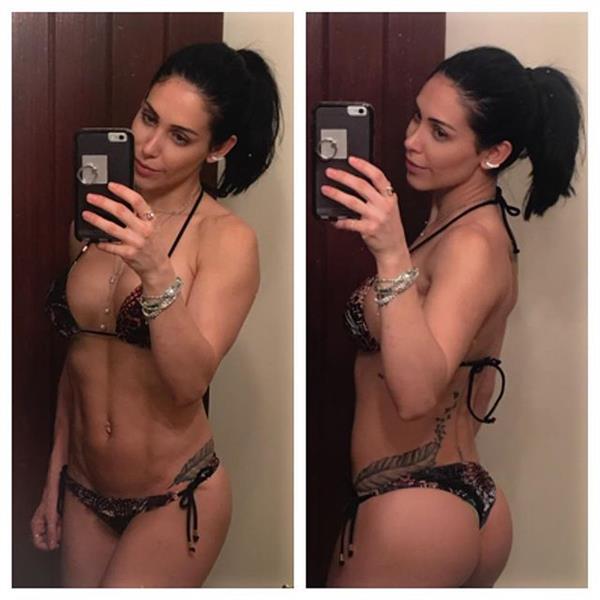 Bella Falconi in a bikini taking a selfie and - ass