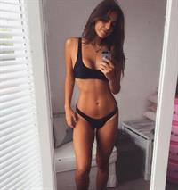 Anonymous in lingerie taking a selfie