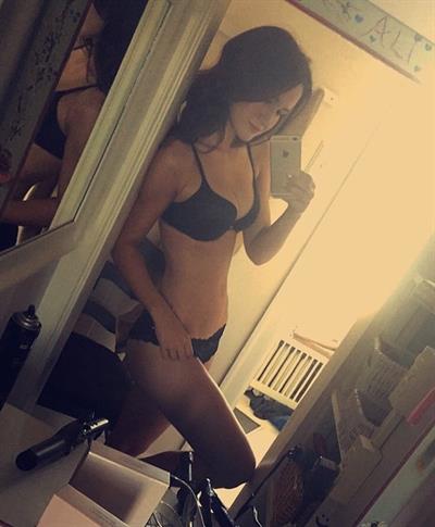 Anonymous in lingerie taking a selfie