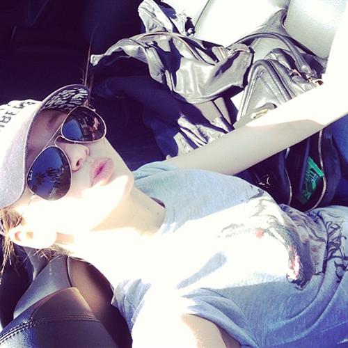 Kristina Romanova taking a selfie