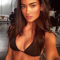 Kelly Gale in a bikini taking a selfie