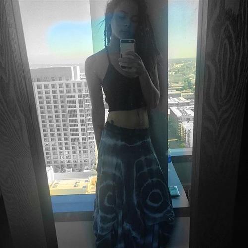 Sasha Lane taking a selfie