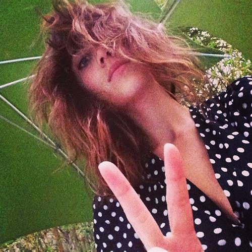 Alexa Chung taking a selfie