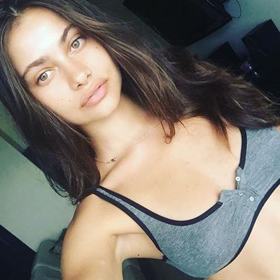 Yara Khmidan in a bikini taking a selfie