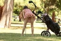 Alicia Arden golfing in a tiny skirt.  Upskirt pink panties.