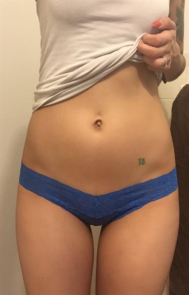 Anonymous in lingerie taking a selfie