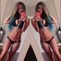 Sheala Foster in a bikini taking a selfie