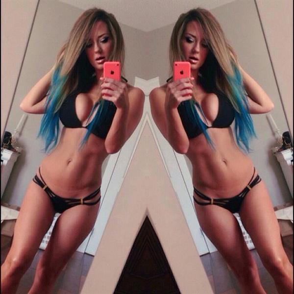 Sheala Foster in a bikini taking a selfie