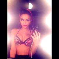 Lisa Ramos in lingerie taking a selfie