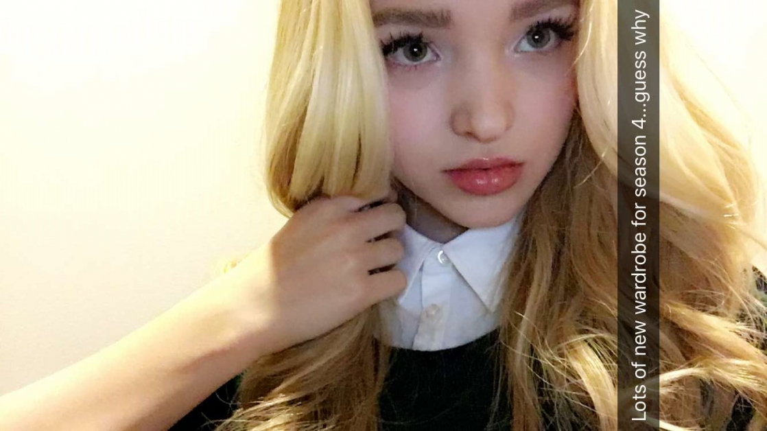 Dove Cameron taking a selfie
