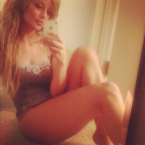 Audrey Allen in lingerie taking a selfie