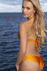 Elisandra Tomacheski in a bikini - ass