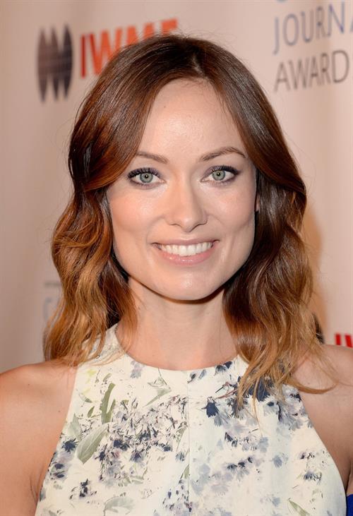 Olivia Wilde debuts her small baby bump while attending the 2013 International Women’s Media Foundation’s Courage in Journalism Awards at the Beverly Hills Hotel on Tuesday (October 29, 2013) in Beverly Hills, Calif.