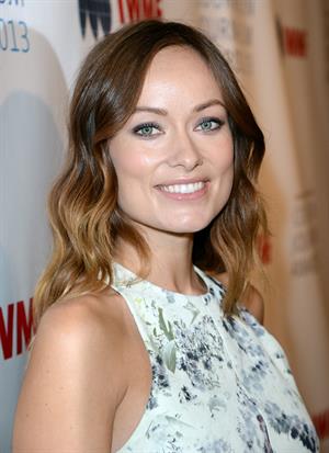 Olivia Wilde debuts her small baby bump while attending the 2013 International Women’s Media Foundation’s Courage in Journalism Awards at the Beverly Hills Hotel on Tuesday (October 29, 2013) in Beverly Hills, Calif.
