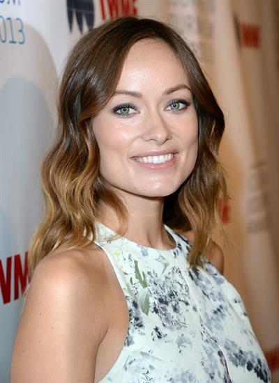 Olivia Wilde debuts her small baby bump while attending the 2013 International Women’s Media Foundation’s Courage in Journalism Awards at the Beverly Hills Hotel on Tuesday (October 29, 2013) in Beverly Hills, Calif.
