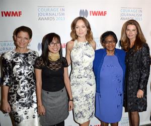 Olivia Wilde debuts her small baby bump while attending the 2013 International Women’s Media Foundation’s Courage in Journalism Awards at the Beverly Hills Hotel on Tuesday (October 29, 2013) in Beverly Hills, Calif.