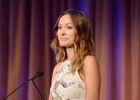 Olivia Wilde debuts her small baby bump while attending the 2013 International Women’s Media Foundation’s Courage in Journalism Awards at the Beverly Hills Hotel on Tuesday (October 29, 2013) in Beverly Hills, Calif.